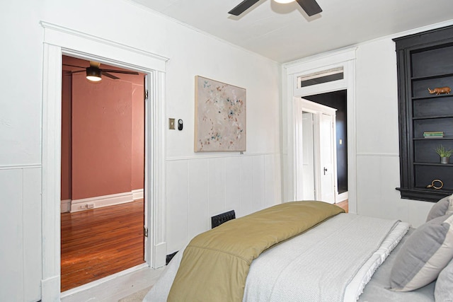 bedroom featuring light hardwood / wood-style flooring and ceiling fan