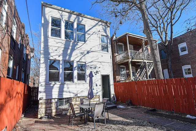 rear view of house featuring a patio area