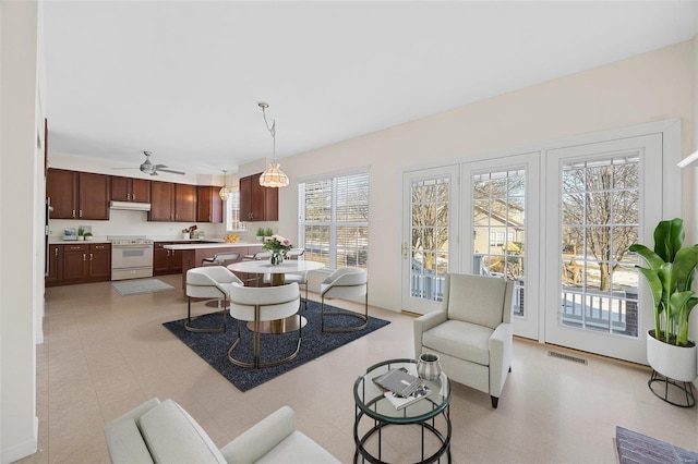 dining area featuring visible vents