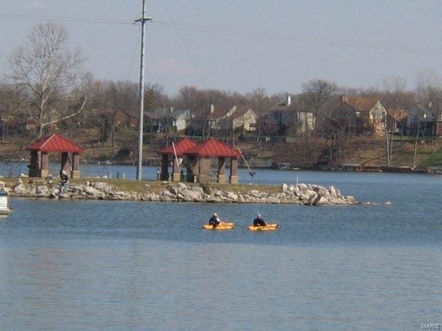 property view of water with a gazebo