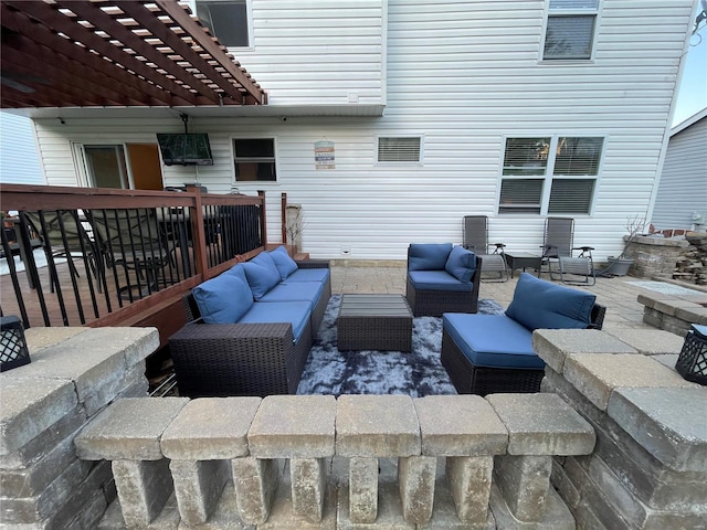 wooden deck featuring a pergola and outdoor lounge area