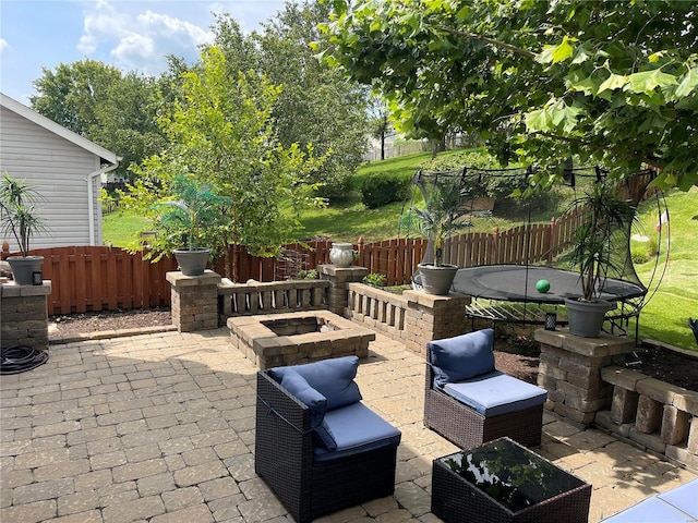 view of patio / terrace featuring a fire pit