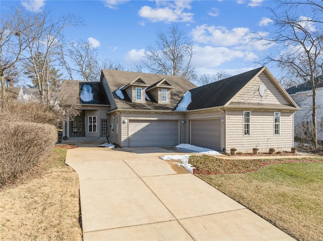 cape cod-style house with a front lawn