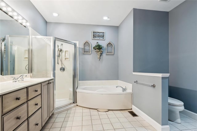 full bathroom with vanity, tile patterned floors, shower with separate bathtub, and toilet