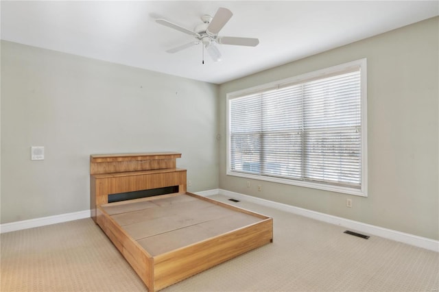 bedroom featuring carpet and ceiling fan