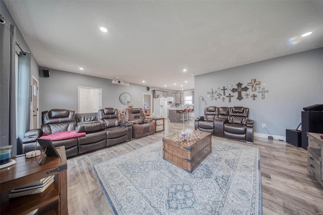 living room featuring light wood-type flooring