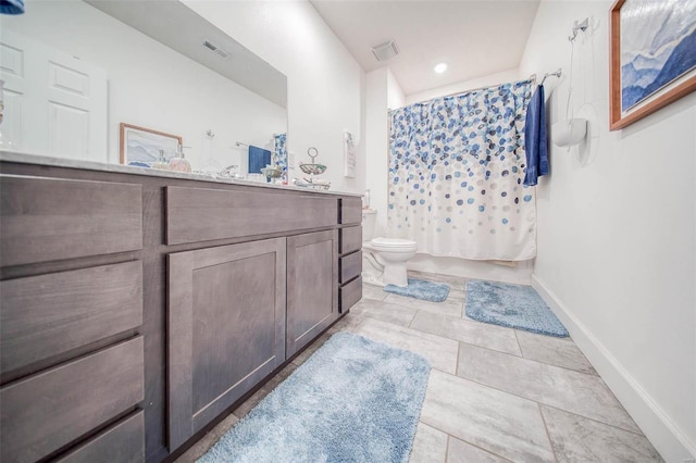 full bathroom with vanity, shower / bath combo, tile patterned floors, and toilet