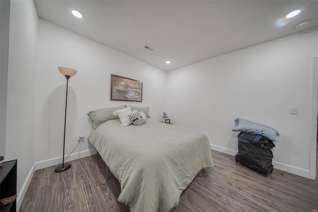 bedroom featuring hardwood / wood-style floors