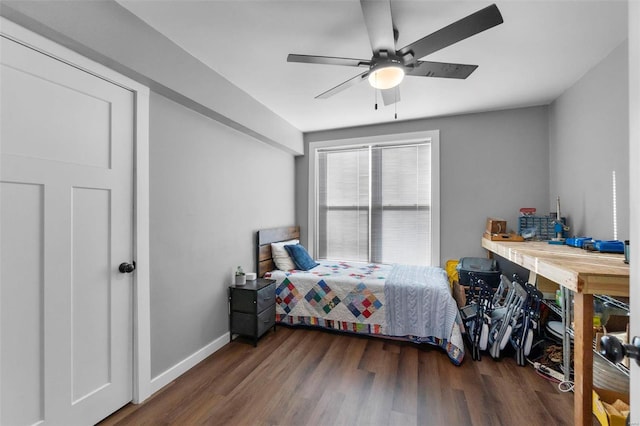 bedroom with dark wood-type flooring and ceiling fan