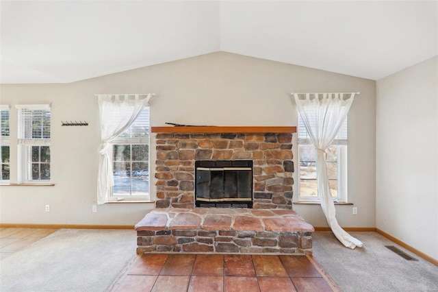 carpeted living room with lofted ceiling and a fireplace