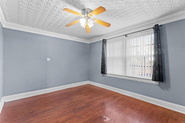 empty room featuring crown molding, ceiling fan, and hardwood / wood-style flooring