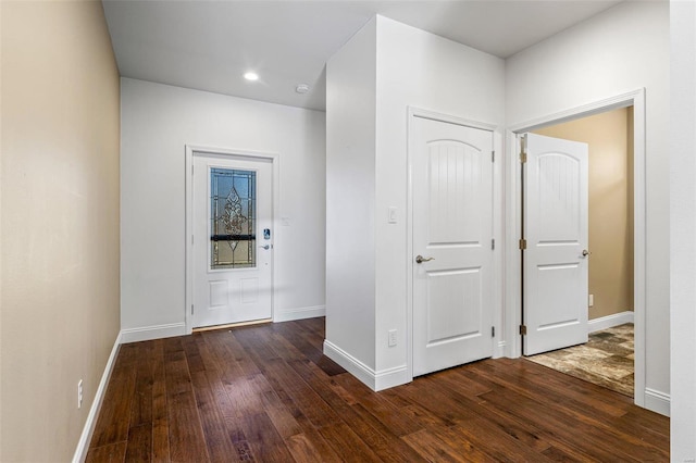 foyer featuring dark wood-type flooring