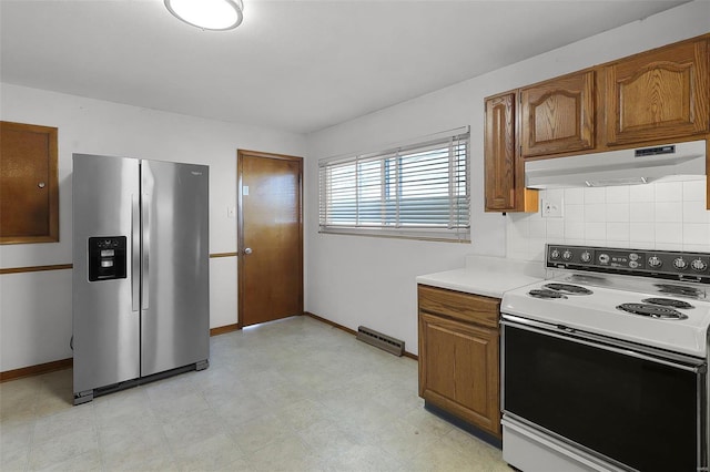 kitchen with stainless steel refrigerator with ice dispenser and white electric stove