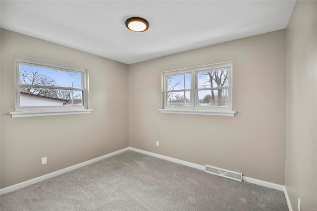 view of carpeted spare room