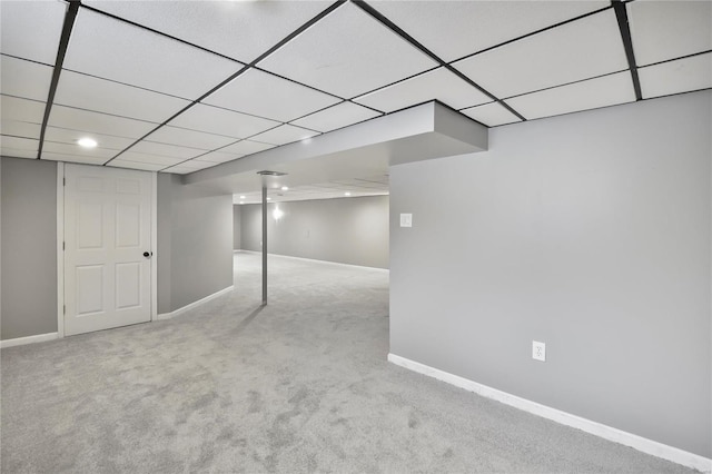 basement with light colored carpet