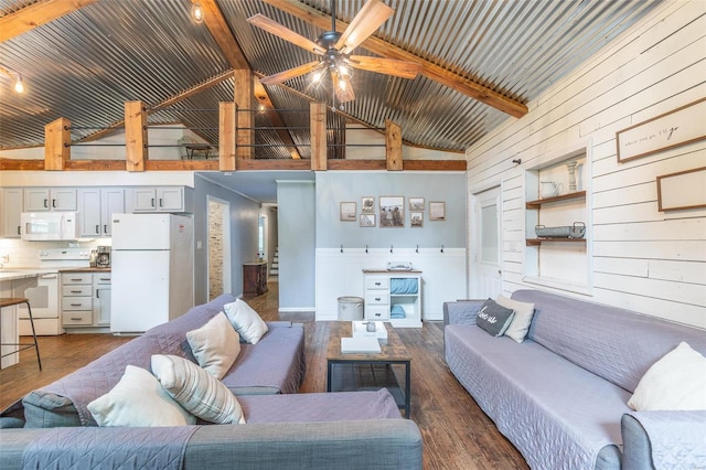 living room featuring high vaulted ceiling, dark hardwood / wood-style floors, beam ceiling, and ceiling fan