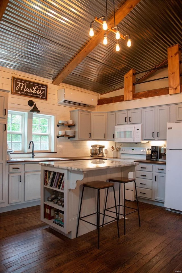 kitchen featuring white cabinetry, dark wood-type flooring, white appliances, and tasteful backsplash