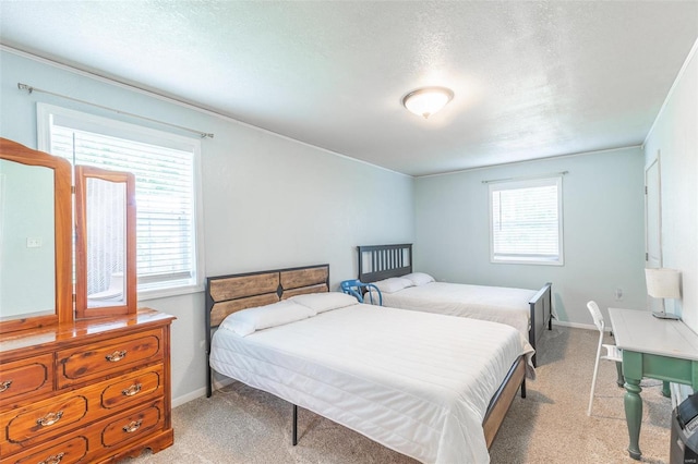 carpeted bedroom with a textured ceiling