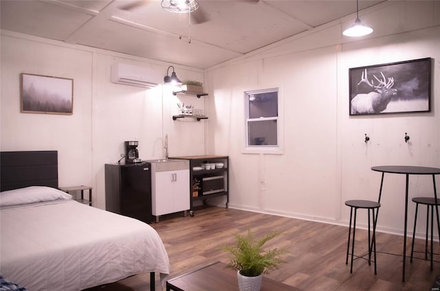 bedroom featuring ceiling fan, dark hardwood / wood-style floors, a wall unit AC, and lofted ceiling