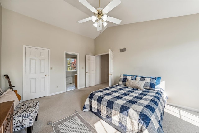 carpeted bedroom featuring connected bathroom, high vaulted ceiling, and ceiling fan