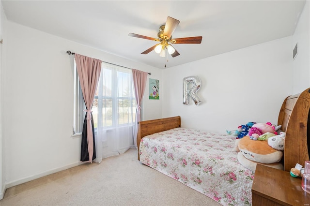 bedroom featuring ceiling fan and carpet flooring