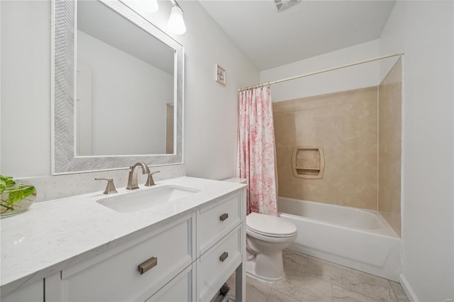 full bathroom with vanity, toilet, and shower / tub combo with curtain