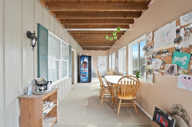 sunroom / solarium with beam ceiling