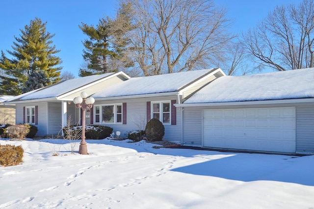 single story home featuring a garage