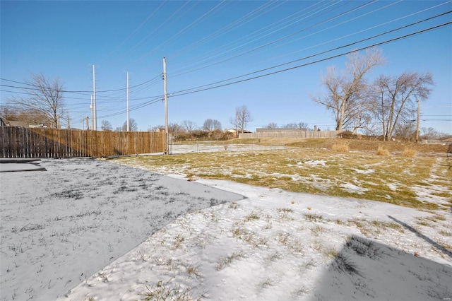 view of yard covered in snow