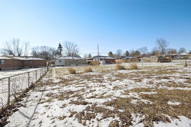 view of yard covered in snow