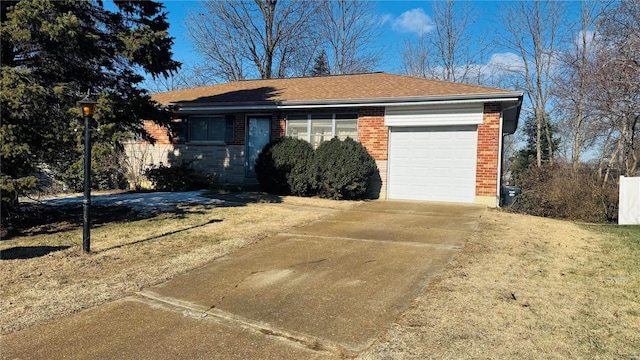 exterior space with a yard and a garage