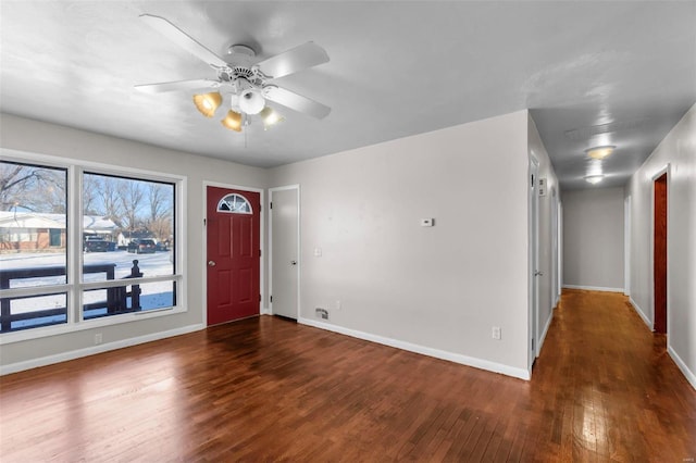 entryway featuring ceiling fan and dark hardwood / wood-style flooring