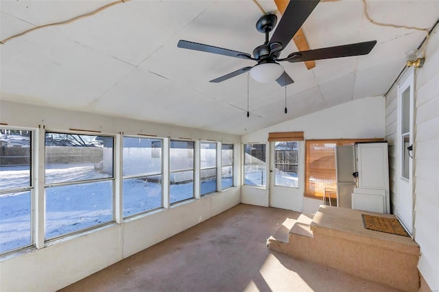 unfurnished sunroom featuring ceiling fan and lofted ceiling