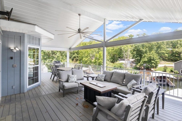 wooden terrace featuring an outdoor living space