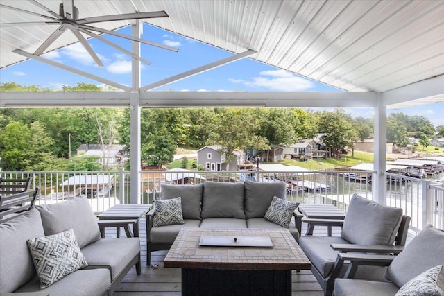 view of patio / terrace featuring an outdoor hangout area and a water view