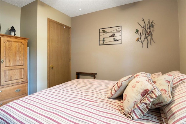 bedroom featuring a textured ceiling