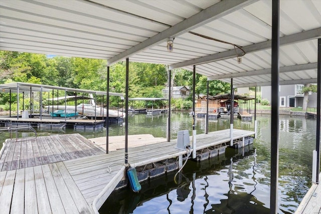 dock area with a water view