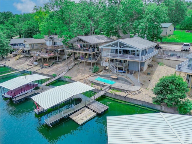 bird's eye view with a water view