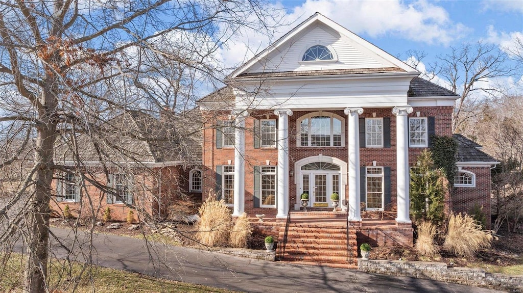 view of greek revival inspired property