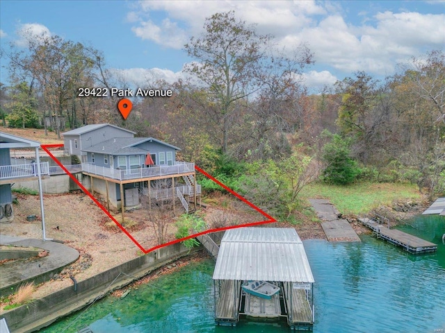 exterior space with a water view