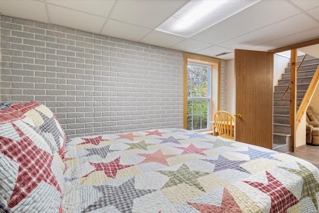 bedroom with a drop ceiling