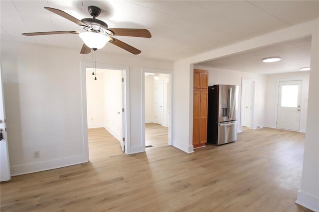 unfurnished living room with light wood-type flooring