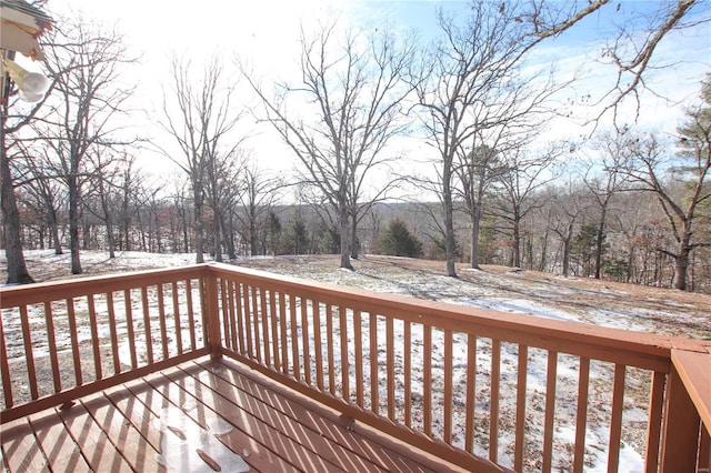 view of snow covered deck