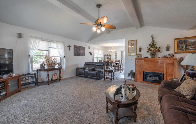 living room with a textured ceiling, ceiling fan with notable chandelier, carpet flooring, and vaulted ceiling with beams