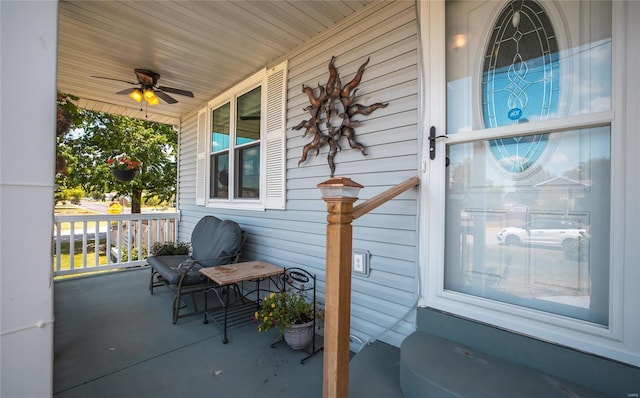 view of patio featuring ceiling fan