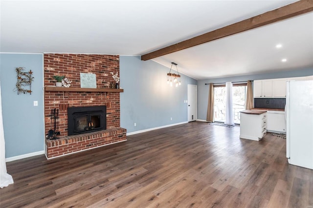 unfurnished living room with a brick fireplace, dark wood-type flooring, and vaulted ceiling with beams