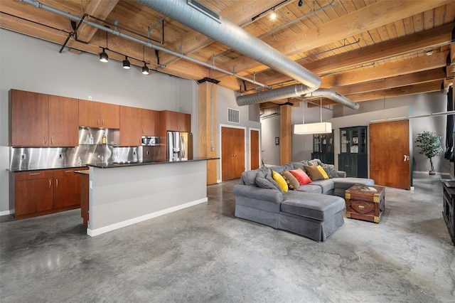 living room with wooden ceiling, a high ceiling, beamed ceiling, and rail lighting