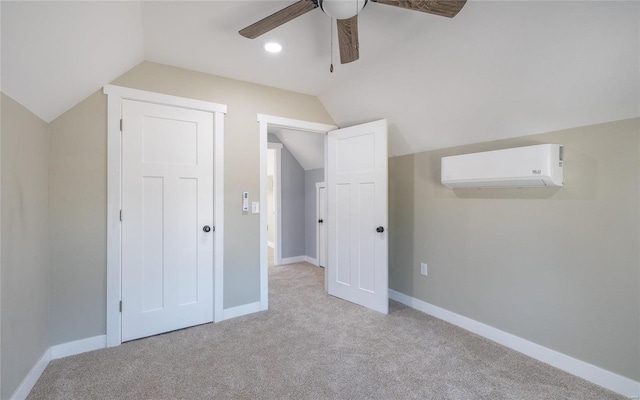 additional living space featuring light carpet, vaulted ceiling, an AC wall unit, and ceiling fan