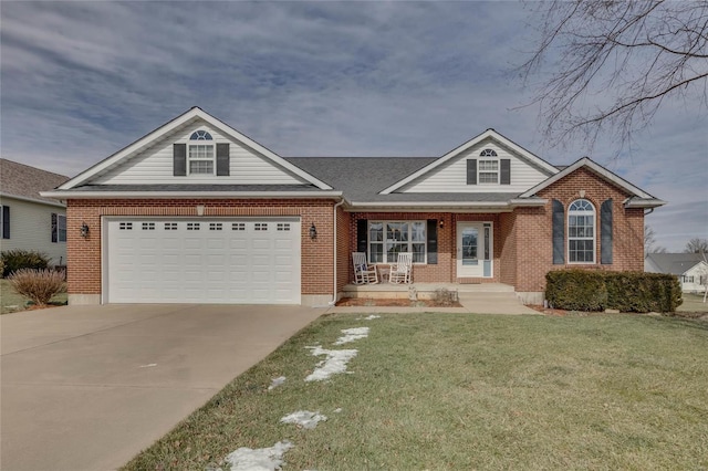 view of front of house with a garage, a front yard, and a porch