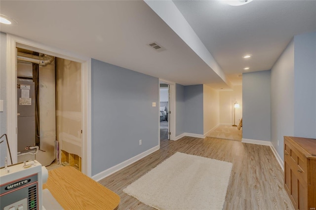 basement with light wood-type flooring